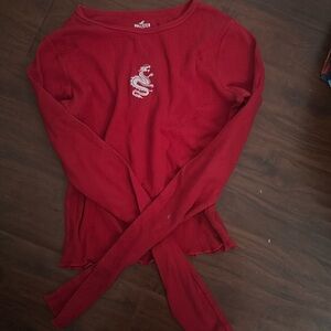 Hollister small red shirt with dragon on it